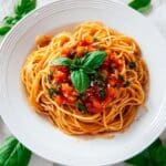 Spaghetti with Uncooked Tomato Sauce, Ricotta Salata, and Fresh Herbs Recipe