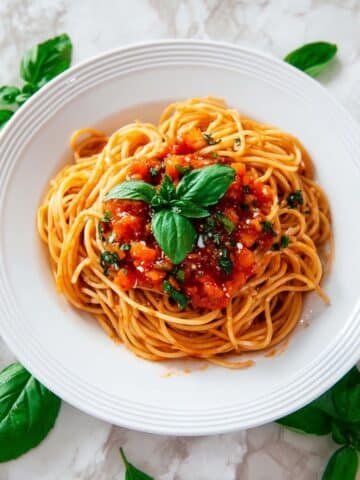 Spaghetti with Uncooked Tomato Sauce, Ricotta Salata, and Fresh Herbs Recipe