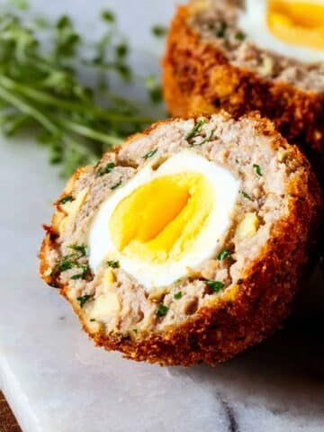 Homemade Traditional Scotch Egg with Sage, Onion, and Apple Stuffing Recipe