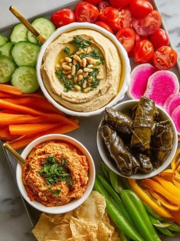 Hummus Board with Fresh Veggies and Tasty Garnishes Recipe