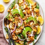Roasted Cauliflower Chickpea and Arugula Salad with Tahini Dressing Recipe