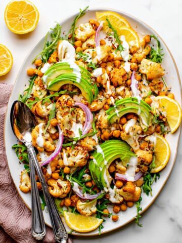 Roasted Cauliflower Chickpea and Arugula Salad with Tahini Dressing Recipe