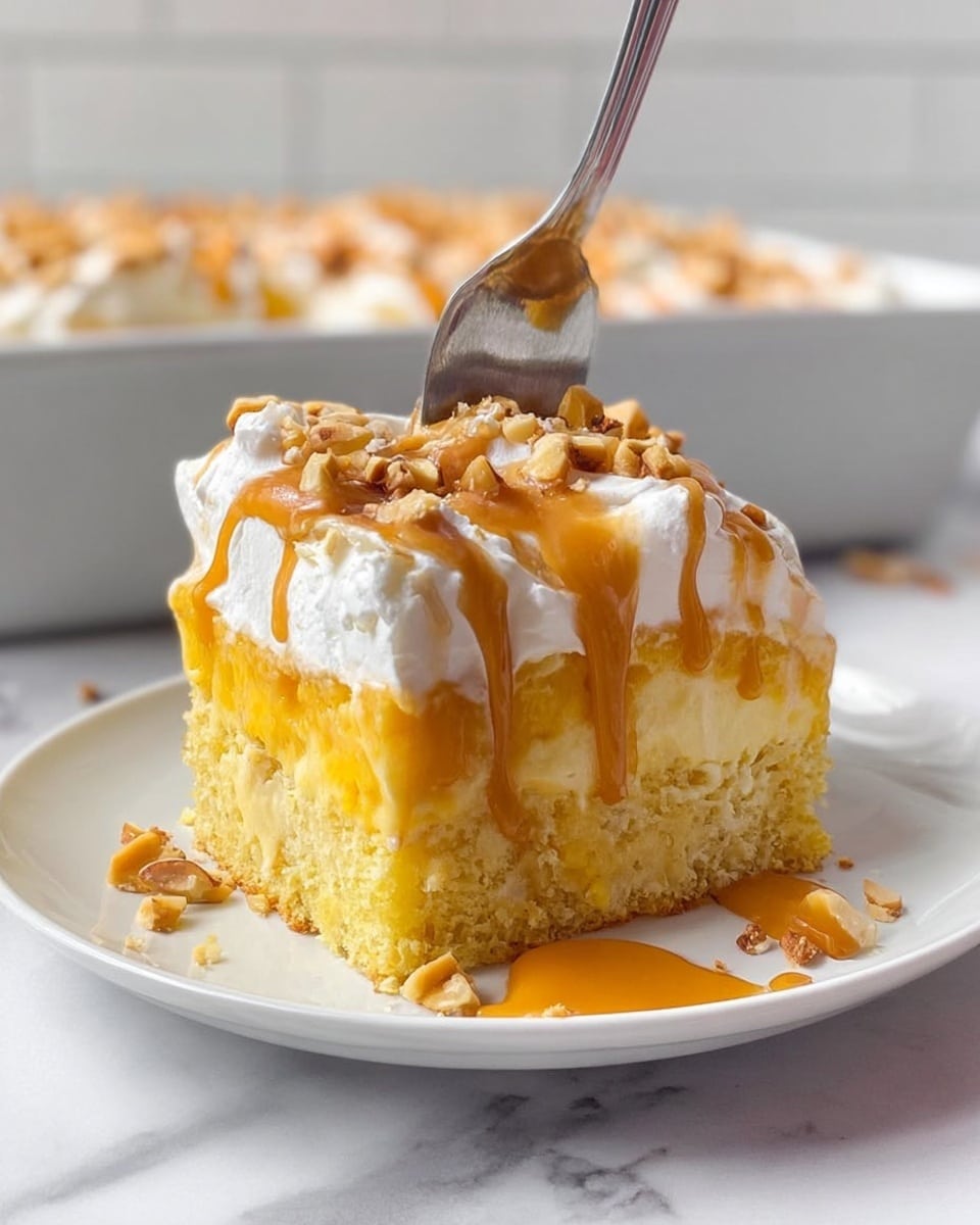 A rectangular metal baking dish filled with a dessert that has three visible layers: the bottom layer is a solid light base mostly hidden, the middle is thick and creamy white, and the top is covered with swirled caramel sauce in a golden brown color spread unevenly. Chopped nuts are sprinkled all over the top, adding texture and small brown tones. The dish is set on a white marbled surface with a striped white and gray cloth underneath. Nearby are stacked white plates on the left, a small white bowl of extra chopped nuts on the right, and a small white bowl of caramel sauce with a spoon. A woman's hand holding a spoon is partially visible in the caramel bowl. The overall scene is bright and clear. photo taken with an iphone --ar 4:5 --v 7