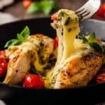 Stuffed Chicken Breasts with Pesto, Mozzarella, and Cherry Tomatoes Recipe