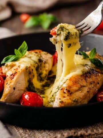 Stuffed Chicken Breasts with Pesto, Mozzarella, and Cherry Tomatoes Recipe