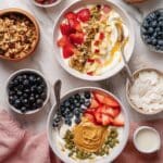 Yogurt Bowls with Fresh Fruit, Nut Butter, and Crunchy Toppings Recipe