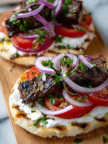 Juicy Oven-Baked Kebabs with Garlic Yoghurt and Sumac Onions Recipe
