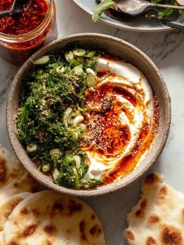 Harissa Eggs in Whipped Goat Cheese with Avocado Salad and Chili Butter Recipe