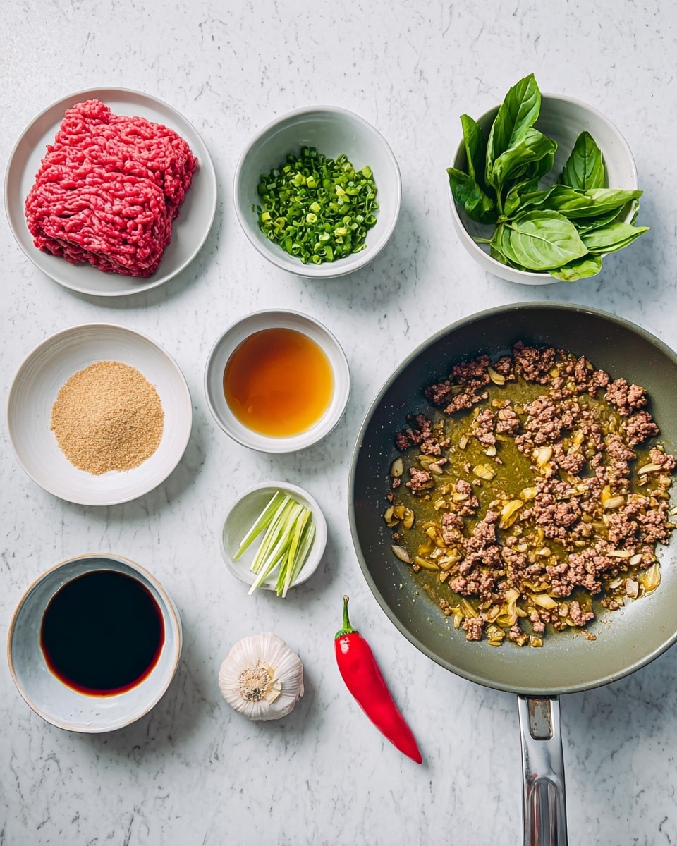 A cooking pan on the right side contains small pieces of browned garlic and onions sizzling in oil, showing a light golden texture. Next to the pan is a single red chili pepper laying on a white marbled surface. On the left side, there are several small white bowls and plates arranged in a neat grid, each holding different ingredients: on the top left is a plate with bright red raw ground meat with visible texture lines; below it, a bowl with amber-colored liquid sauce; next to it is a bowl with light brown granulated sugar; a shallow bowl with dark soy sauce sits near the bottom center; above it is a dish with chopped fresh green herb pieces; at the top center is a bowl filled with fresh bright green basil leaves; beside it is a small plate holding a single garlic clove; to the right is a bowl with thin green vegetable sticks. The whole setup is on a smooth white marbled surface with clear, simple lighting. photo taken with an iphone --ar 4:5 --v 7