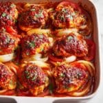 Baked Chicken Thighs with Spiced Tomato Rub and Roasted Onions Recipe