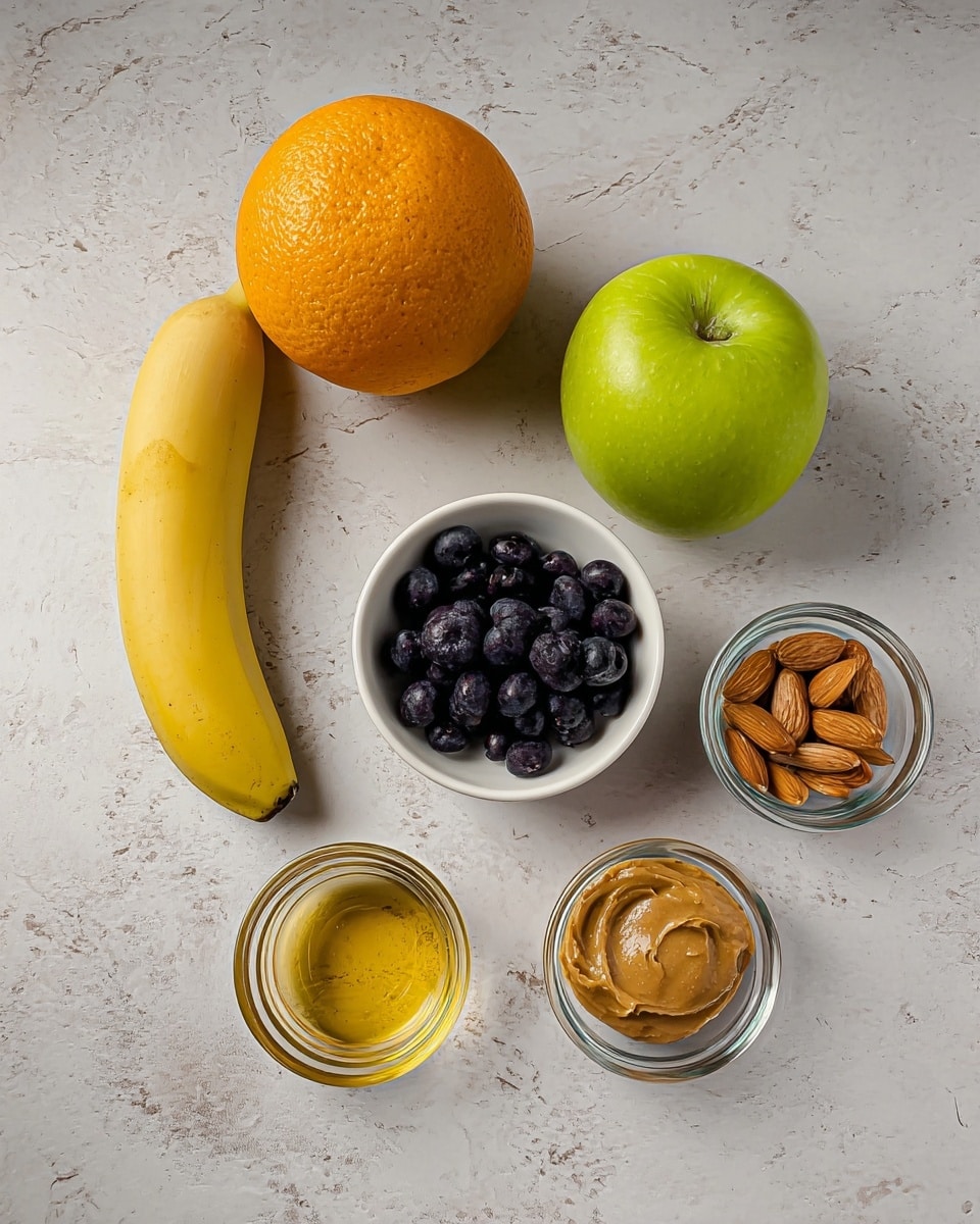 The image shows a simple arrangement of fruits and small bowls with ingredients on a white marbled surface. There is one yellow banana on the left, a green apple in the middle, and a large orange on the right. Below them, there is a small white bowl filled with dark blueberries near the orange. In front, there are three small clear glass bowls: one with golden honey, one with whole almonds, and one with smooth peanut butter. The items are spaced out nicely, showing their natural colors and textures clearly. photo taken with an iphone --ar 4:5 --v 7