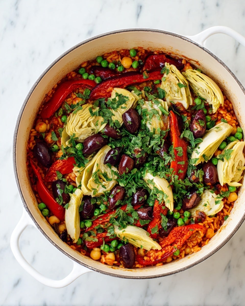 The dish is shown in a white cooking pot set on a white marbled surface. The bottom layer inside the pot is a reddish-orange rice mixed with chickpeas, visible through the top layers. On top of this is a layer of bright green peas scattered evenly. The top layer consists of roasted red bell pepper slices, creamy yellow artichoke hearts cut into wedges, and dark purple olives, all sprinkled with chopped fresh green parsley. The mix of colors and textures creates a vibrant, fresh look. photo taken with an iphone --ar 4:5 --v 7