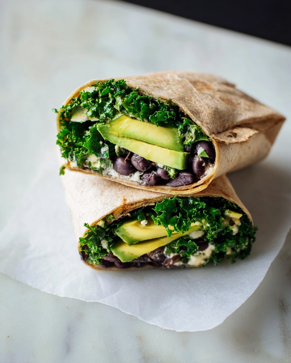 The image shows a tortilla wrap cut in half and stacked, with the top half slightly tilted upwards to display the layers inside. The outer layer is a soft light brown tortilla. Inside, there is a layer of black beans, dark and small, followed by a middle layer of bright green, leafy kale mixed with bits of white cheese. On top of the kale, there are slices of creamy yellow-green avocado. The wrap is placed on a piece of white paper on a white marbled surface. Photo taken with an iphone --ar 4:5 --v 7