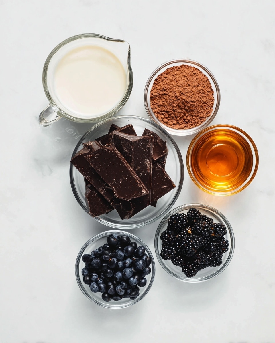 Five clear glass bowls are arranged on a white marbled surface. The center bowl holds large pieces of dark chocolate with a rich, slightly shiny texture. Above it, a smaller bowl contains light brown cocoa powder with a slightly crumbly texture. To the left, a glass measuring cup holds a creamy white liquid with smooth texture. Above it, another small bowl holds a golden amber liquid with a glossy surface. Below the chocolate bowl, two small bowls hold dark, shiny blueberries and blackberries, both with a plump and slightly wet appearance. Photo taken with an iphone --ar 4:5 --v 7