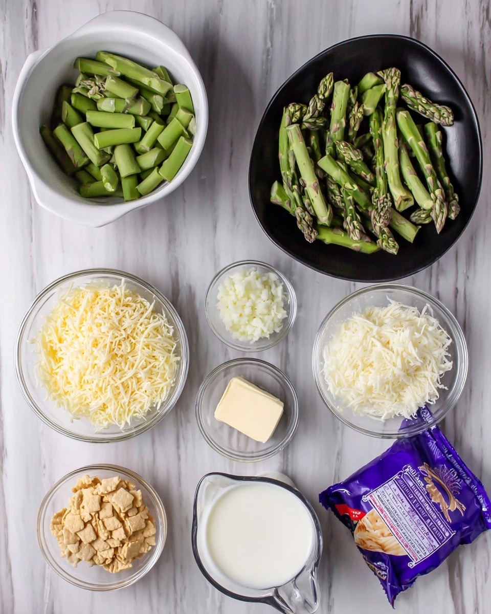 The image shows several ingredients arranged neatly on a white marbled surface. There is a white bowl filled with fresh green asparagus pieces, a small clear glass bowl with chopped shallots, and another small bowl containing minced garlic. A larger black bowl holds a pile of shredded white cheese. There is a clear glass measuring cup filled with milk, and next to it, a purple packet of shredded sharp cheddar cheese. A clear bowl contains crushed crackers, and another smaller glass bowl has a dollop of white flour. A small wrapped butter piece is placed near the bowls, all set on a clean white marbled texture photo taken with an iphone --ar 4:5 --v 7