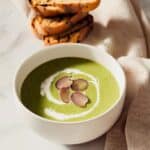 Roasted Creamy Asparagus Soup with Lemon Zest and Grape Garnish Recipe