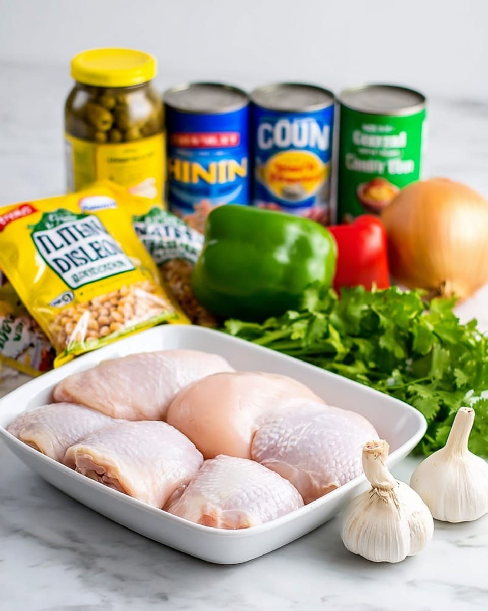 The image shows a white shallow dish in the center holding four raw chicken pieces with a light pink color and smooth texture, arranged side by side. Behind the dish, there are cans and a small seasoning packet lined up horizontally: from left to right, there is a yellow jar of pickles, a packet of Italian salad dressing mix, two blue cans of beans, a green can of sweet corn, and a red can of diced tomatoes. To the right of the cans, a fresh whole green bell pepper and a bunch of cilantro with bright green leaves are placed. In front of the jar and cans, a yellow onion with a papery skin and a whole bulb of garlic with white papery layers sit close to the dish on a white marbled surface. The scene is bright and clear with a clean white background. photo taken with an iphone --ar 4:5 --v 7