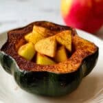 Slow Cooker Apple-Stuffed Acorn Squash with Cranberries and Spices Recipe