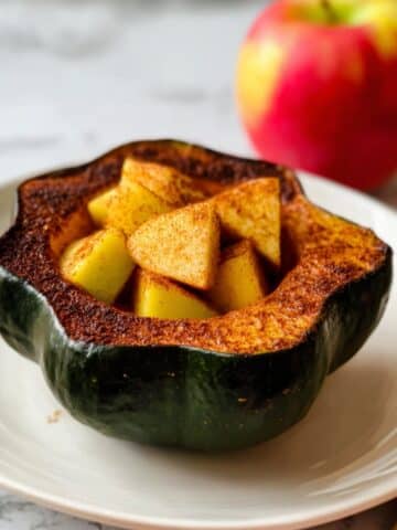 Slow Cooker Apple-Stuffed Acorn Squash with Cranberries and Spices Recipe