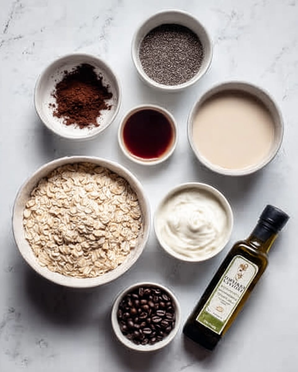 The image shows six white bowls and a small bottle of olive oil placed on a white marbled surface. One large white bowl is filled with light beige rolled oats, placed in the bottom left. Above it, a smaller white bowl contains a mix of dark brown cocoa powder and small black chia seeds. To the right of that is a white bowl filled with light beige creamy liquid, and below it, there is another white bowl containing thick white yogurt. Above the bowl of oats is a small white bowl with a dark reddish-brown syrup. Near the yogurt bowl at the bottom center is a small white bowl filled with small dark whole coffee beans. A small bottle of extra virgin olive oil lies on the marbled surface, angled with the label facing forward. The photo taken with an iphone --ar 4:5 --v 7
