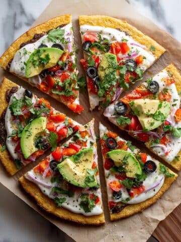 Taco Pizza with Ground Beef, Refried Beans, and Fresh Toppings Recipe