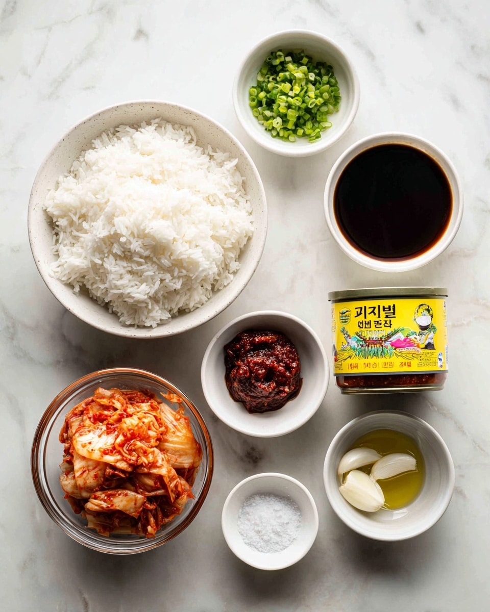 The image shows eight bowls and a can of tuna on a white marbled surface. The biggest bowl on the left holds fluffy white rice with visible grain texture. Above it is a small white bowl filled with chopped dark green onions. To the right, there is a white bowl with a very dark brown soy sauce. Below the soy sauce is a can with a bright yellow lid and colorful Korean text. Below the large rice bowl, there is a clear glass bowl holding bright red kimchi with visible chili paste and cabbage pieces in layers. A small glass bowl contains a thick, dark red chili paste. Next to it is a small white bowl filled with chopped white garlic. On the bottom right, a small white bowl holds a coarse white salt, and above it is a small white bowl with light green oil. The overall setting is neat with light lighting, photo taken with an iphone --ar 4:5 --v 7