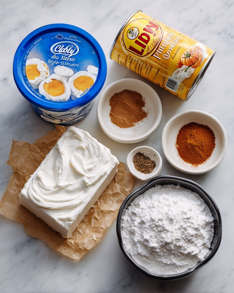 A top-down view of ingredients arranged on a white marbled surface includes a white round container of Cool Whip original topping with its blue lid featuring small images of whipped cream uses, a white rectangular block of cream cheese resting on a piece of brown parchment paper, two small white bowls each filled with brown spices, a can of Libby's 100% pure pumpkin with yellow and red labels showing a pumpkin pie image, and a black bowl filled with white powdered sugar. photo taken with an iphone --ar 4:5 --v 7
