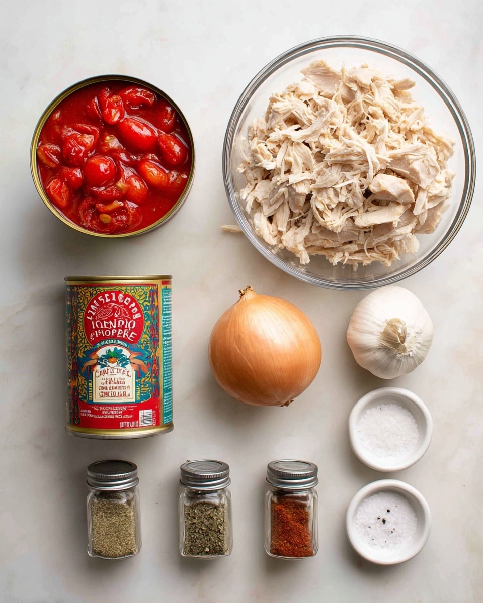 A top-down view of raw ingredients arranged neatly on a white marbled surface. At the top right, there is a clear bowl filled with shredded light beige chicken pieces. To the left of the bowl, there is a can of diced tomatoes with a green and white label showing roasted red tomatoes. Below it, there is a can of chipotle peppers in adobo sauce with a red and blue label. To the right of the chipotle can, there is one whole light brown onion and one white garlic bulb next to it. At the bottom, three clear spice jars with silver lids are lined up, labeled cumin, paprika, and oregano from left to right. Next to the jars, two small white bowls hold salt and black pepper. The setup is organized and all items are placed spaced apart on the white marbled surface photo taken with an iphone --ar 4:5 --v 7