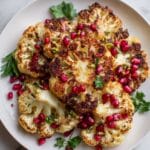 Easy Oven Roasted Cauliflower Steaks with Pistachios, Pomegranate, and Parsley Recipe