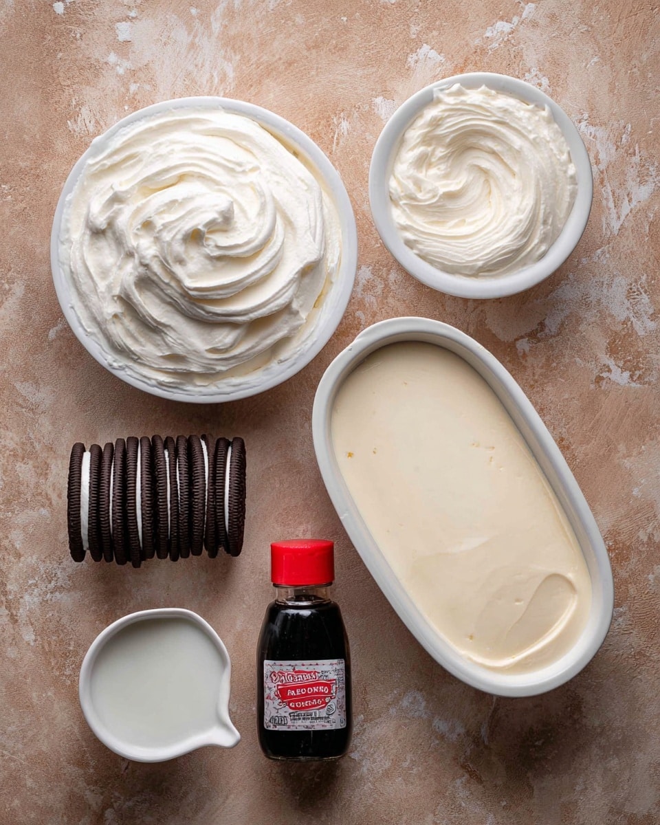 The image shows ingredients for a dessert laid out on a rustic brown surface changed to white marbled texture. There is an oval block of light cream-colored ice cream with a smooth texture on the upper right. Above and slightly to the left is a white round container with white Cool Whip whipped topping, looking soft and fluffy with some swirls visible. On the left side, six Oreo cookies are stacked in a slight arc shape, showing dark black-brown color with white filling in the middle. Below the Oreos is a small white cup filled with white milk. Near the center is a small bottle of dark brown mint extract with a red cap, standing upright. Photo taken with an iphone --ar 4:5 --v 7