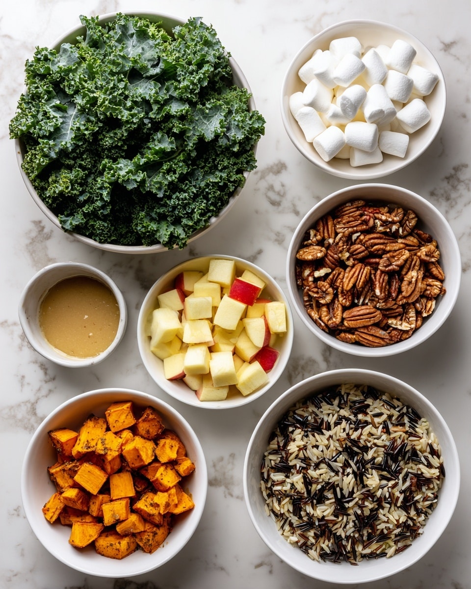 The image shows six white bowls with different food ingredients arranged on a white marbled surface. In the largest bowl at the bottom, there is a layer of fresh, dark green kale leaves with curly edges. Above it and spread out are five smaller white bowls. One bowl contains chopped pecans in light brown; next to it is a bowl of light brown dressing or sauce. Another bowl holds small white marshmallows, and beside that is a bowl of diced yellow apple with red skin bits on the edges. One bowl has roasted orange sweet potato chunks, and the last bowl contains a mix of wild rice with black and brown grains. Photo taken with an iphone --ar 4:5 --v 7