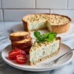 Savory Pesto and Parmesan Cheesecake with Pine Nuts Recipe