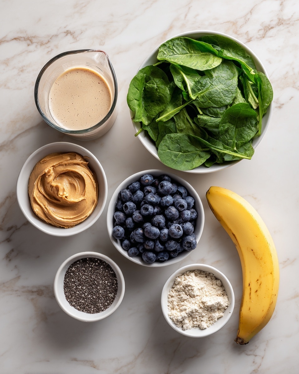 The image shows six ingredients arranged on a white marbled surface: a clear glass measuring cup with a light beige liquid at the top left, a bright yellow banana placed horizontally below it, a small white bowl filled with fresh green spinach leaves at the top right, a white bowl of round dark blue blueberries below the spinach, a white bowl of light brown creamy peanut butter to the left of the blueberries, a white bowl with off-white crumbled powder next to the peanut butter, and a small white bowl filled with dark chia seeds below the powder. The layout is neat and balanced. photo taken with an iphone --ar 4:5 --v 7