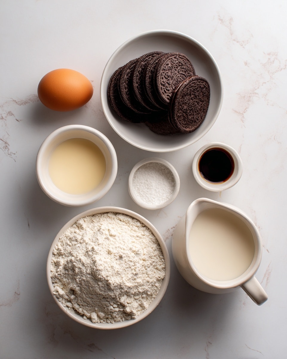 A top view image shows several baking ingredients placed on a white marbled surface, arranged neatly in a vertical line. At the top, there is a white bowl filled with stacked dark brown sandwich cookies. Below it, there is an orange-brown egg placed directly on the surface. Next to the egg is a small white bowl containing a light cream-colored liquid, and near it, a small rounded container holds a dark, almost black liquid. Below these, a large white bowl is filled with white flour, showing a rough powdery texture. Beside the flour is a small white bowl with a white powdery substance. At the bottom right corner, a white ceramic pitcher holds a light cream-colored milk liquid. The scene is simple, well-lit, and the white bowls and pitcher contrast with the deep brown cookies and orange eggshell. Photo taken with an iphone --ar 4:5 --v 7
