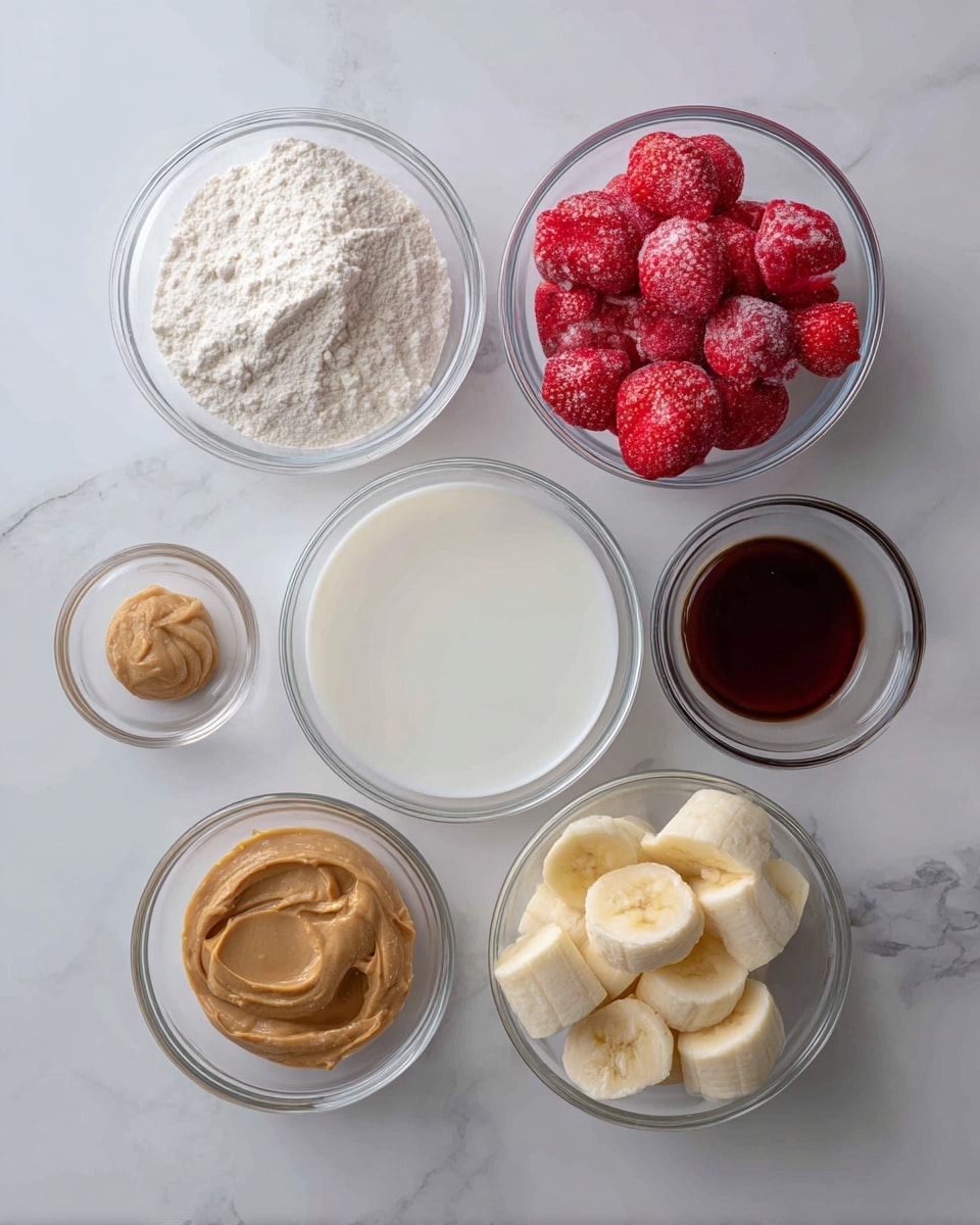 The image shows six clear glass bowls arranged on a white marbled surface. In the top left bowl, there is a white powder labeled protein powder. To its right, there is a bowl filled with red frozen strawberries with a frosty texture. Below the protein powder, a larger bowl contains white milk, either regular or dairy-free. Next to the milk on the right is a small bowl holding dark brown vanilla liquid. Below the vanilla, another small bowl holds light brown peanut butter with a smooth texture. Finally, at the bottom right, there is a bowl with pale yellow frozen banana pieces. Each ingredient is clearly visible and neatly placed. Photo taken with an iphone --ar 4:5 --v 7
