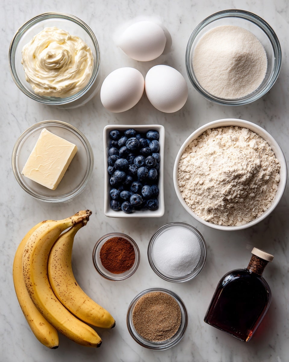 The image shows ingredients neatly arranged on a white marbled surface. There is a small white bowl with two large white eggs at the top center. To the left, a clear glass bowl holds white sour cream with a thick texture. Below it, another clear bowl is filled with fine white granulated sugar. Next to the sugar, a small glass bowl contains white baking soda, and below that is a similar bowl with coarse white kosher salt. In the middle, a small white rectangular dish holds fresh dark blue blueberries. To the right of the eggs, a large white bowl is full of light beige unbleached all-purpose flour with a slightly uneven surface. Below the flour, a small glass bowl contains reddish-brown ground cinnamon, and next to it is another small bowl with brownish-gray ground cardamom. To the right center, there is a bunch of three yellow bananas with brown spots. Below the bananas, there is a stick of yellow unsalted butter wrapped in paper with measurement markings. At the bottom right, there is a dark brown bottle of vanilla extract with a label. Each ingredient is labeled with black text placed directly next to or above it. photo taken with an iphone --ar 4:5 --v 7