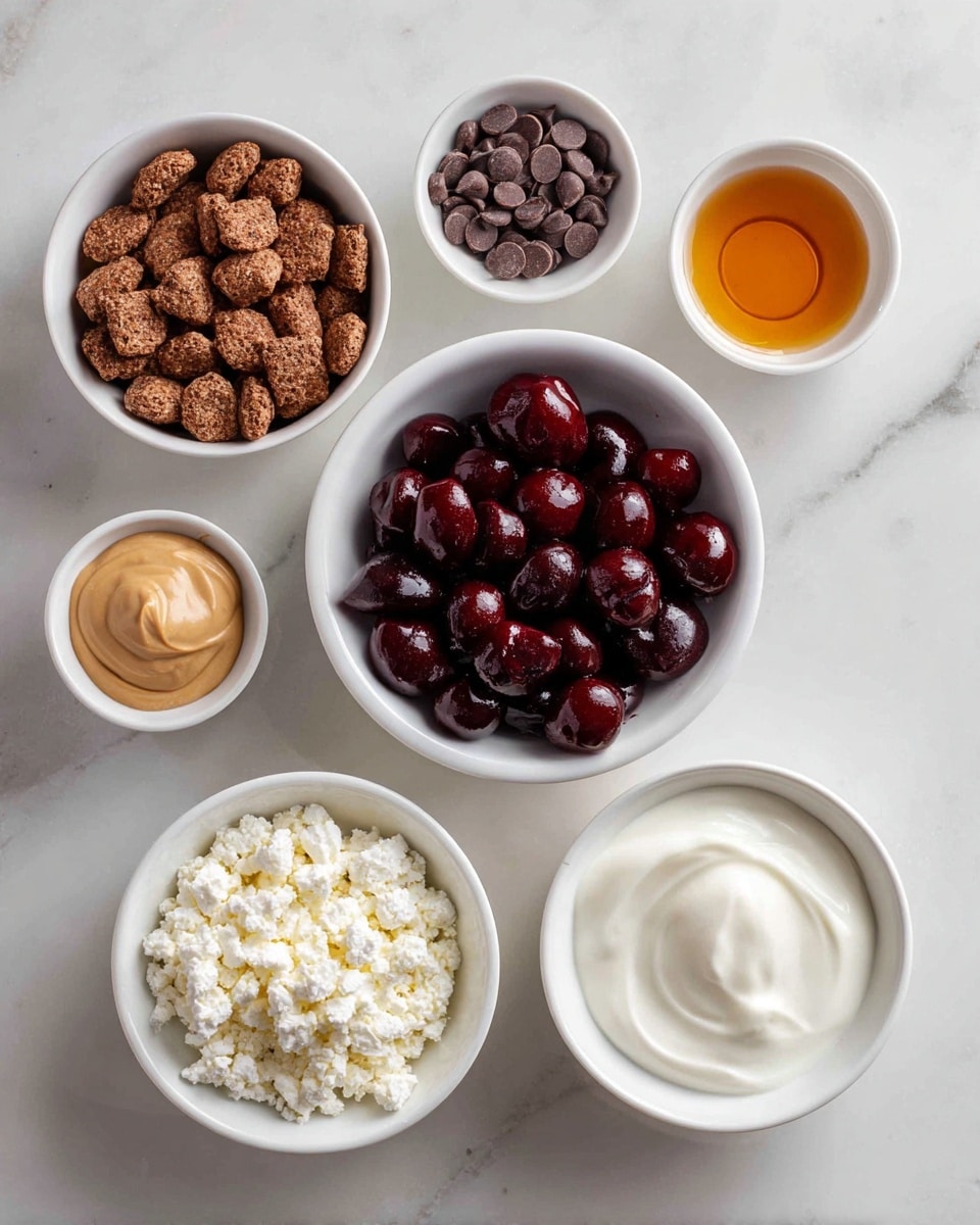 The image shows six white bowls on a white marbled surface. In the center, a large white bowl is filled with dark red frozen pitted cherries with a glossy texture. To the left, a medium white bowl holds chocolate Catalina crunch cereal, small pillow-shaped pieces in various shades of brown. Above it, a small white bowl contains smooth, dark brown chocolate chips. Below the cereal, a small white bowl has creamy almond butter in a light tan color. To the right of the cherries, a medium white bowl holds thick and smooth low sugar vanilla yogurt in a white creamy texture. Below it is a small white bowl filled with crumbly white cottage cheese. Next to the cottage cheese, a shallow small white dish contains amber colored, translucent vanilla extract. The arrangement is neat and all bowls are round and white. photo taken with an iphone --ar 4:5 --v 7