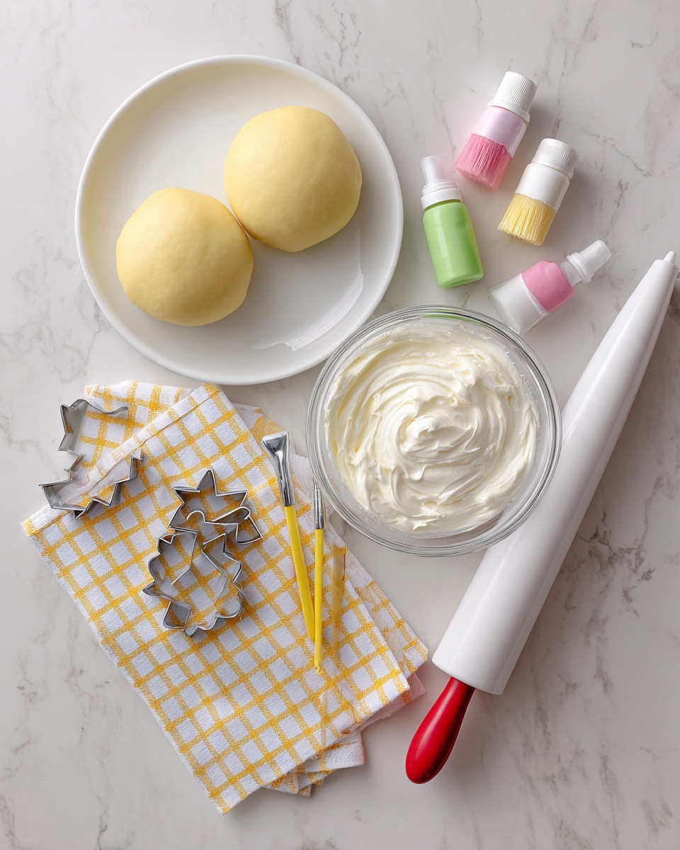 The image shows two smooth balls of light yellow dough placed side by side in a white shallow plate on the upper left. To the right of the plate, there are two small plastic bottles with droppers, one with a yellow cap and one with a pink cap, along with a small brush with a yellow thin handle. Below the dough plate, a white and yellow checkered cloth is spread out with three metal cookie cutters resting on it. Further to the right, a clear glass bowl contains a thick white cream or frosting. Next to the bowl, four small open icing tubes in white, green, yellow, and pink are lined up. Below the tubes, a large piping bag with white icing is visible, resting on a wooden rolling pin with a red edge. The entire scene is set on a white marbled surface. Photo taken with an iphone --ar 4:5 --v 7