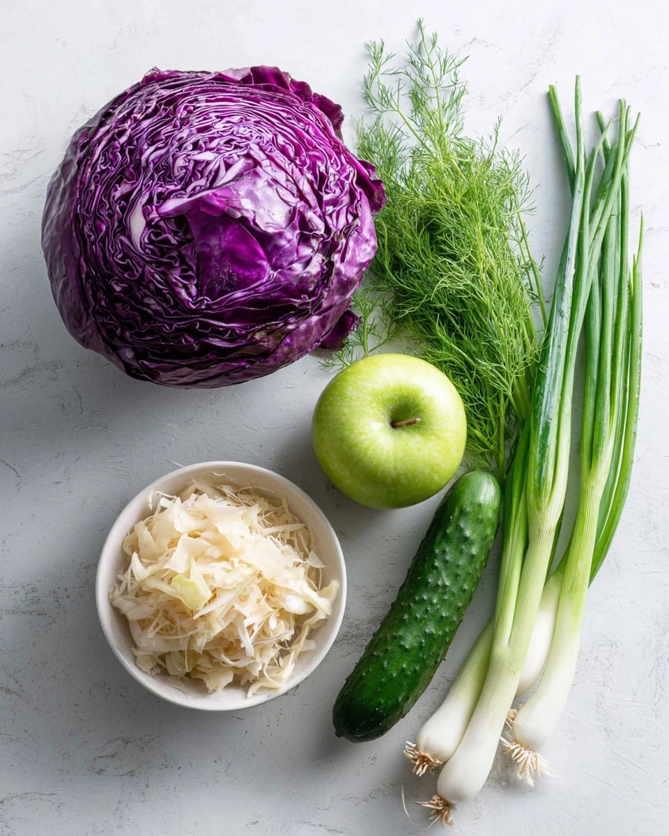 The image shows fresh ingredients arranged on a white marbled surface. On the left, there is a whole round purple cabbage with smooth, shiny leaves. Below it, there is a small white bowl filled with shredded pale yellow sauerkraut. Next to the bowl, a bright green apple with a smooth skin sits close to a bunch of fresh green dill with feathery leaves. A long dark green cucumber with a slightly bumpy texture lies next to the dill. On the far right, there is a group of green onions with white bulbs and long green stems. The colors are vibrant and natural, with the greens and purples standing out clearly. photo taken with an iphone --ar 4:5 --v 7